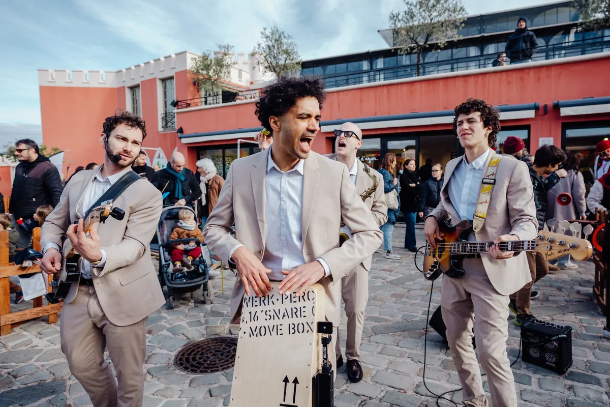 The band playing at a red villa reception