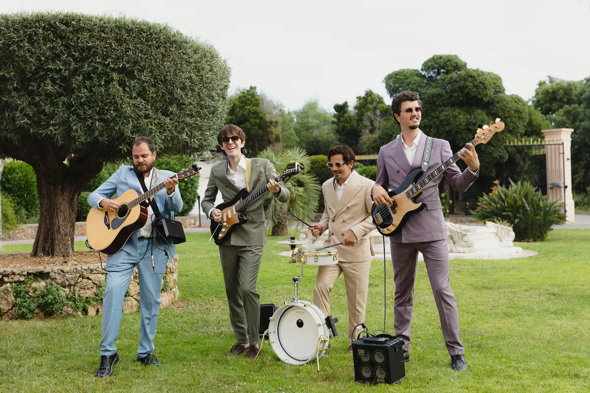 The band on a lawn by a fountain