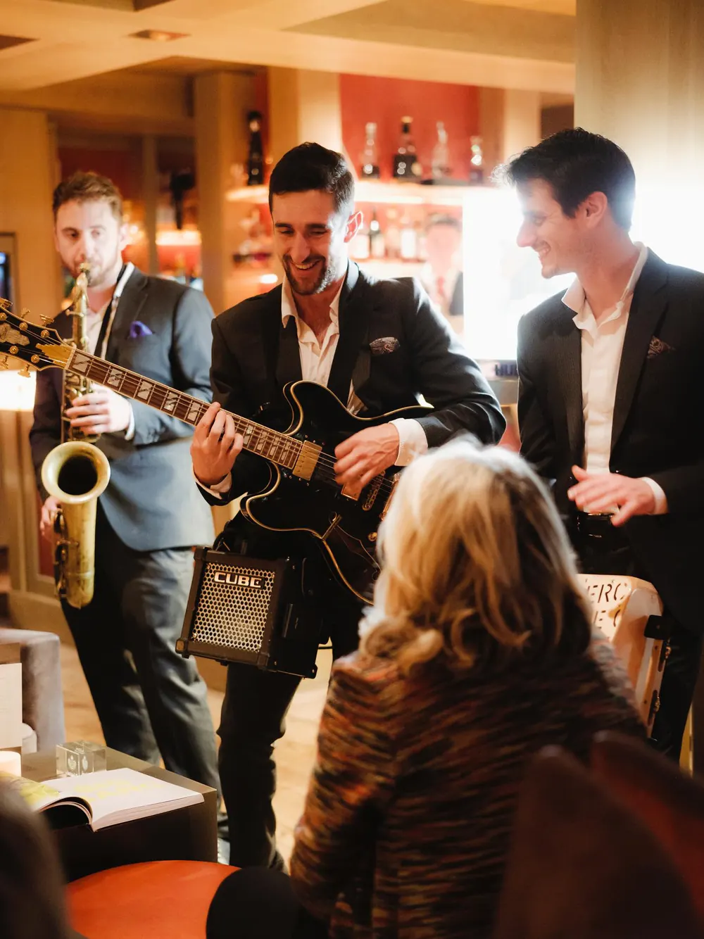 Playing to guests at the bar of a private club