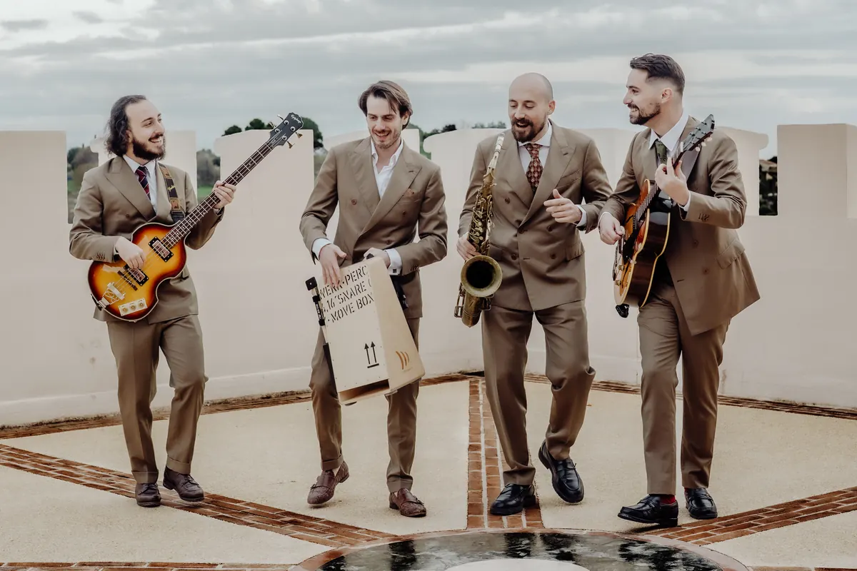The band on a rooftop terrace with instruments