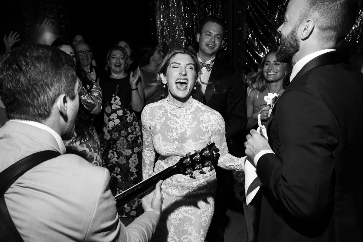 The band playing to the couple at their table